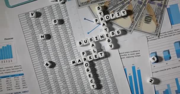 Top View Business Strategy Profit Market Sales Crosswords Puzzle Assembled — Stock Video