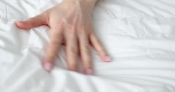 Woman Hand Squeezing White Bed Passionate Orgasm Closeup Movie Slow — Stockvideo
