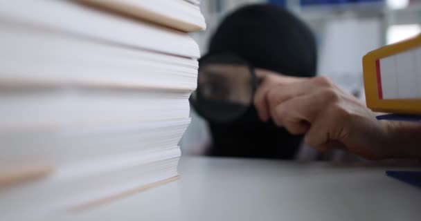 Woman Balaclava Looks Documents Magnifying Glass Fraud Business Theft Intellectual — Vídeo de Stock