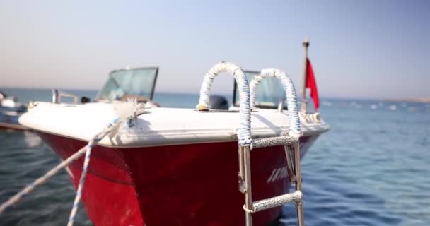 Small Empty Boat Bobbing Waves Tied Pier Sea Trip Boat — Stock Video