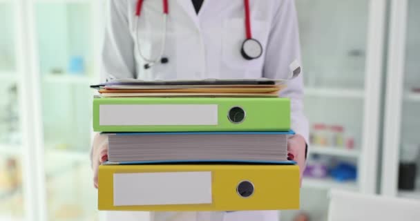 Woman Doctor Work Uniform Holds Stack Folders Paper Documents Concept — Stock Video