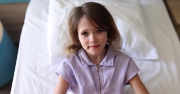 Smiling Schoolgirl Falls Backwards Soft Bed Slow Motion Tired Little — Stock Video