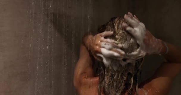 Woman Washes Hair Pouring Foamy Shampoo Running Water Shower Cabin — Stockvideo