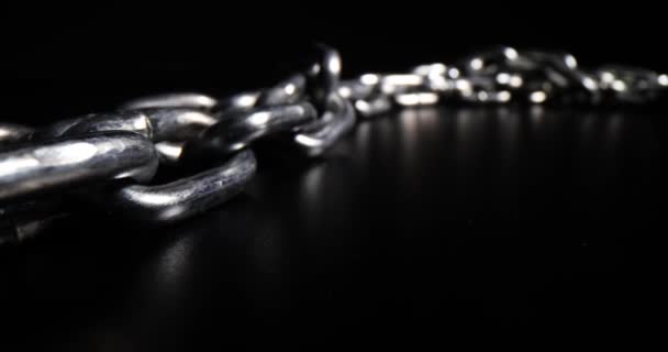 Massive Silver Chain Links Made Steel Lies Black Surface Leaving — Vídeo de stock