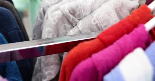 Multi Colored Terry Bathrobes Sale Hang Hangers Store Sales Concept — Video Stock
