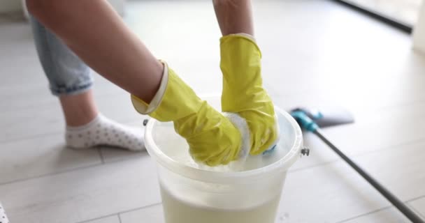 Woman Rubber Gloves Wrings Foamy Mop Rag Bucket Water Room — Video Stock