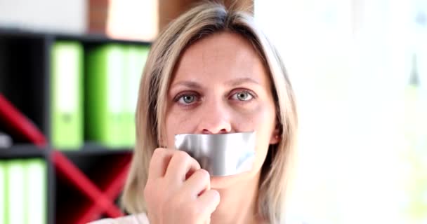 Woman Office Removes Sticky Tape Mouth Close Concept Freedom Speech — Stock Video