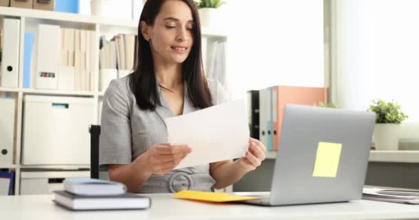 Woman Taking Letters Out Yellow Envelope Rejoicing Office Movie Winning — Stock Video