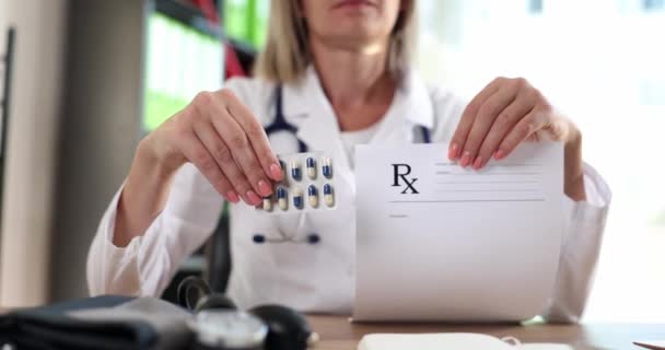 Doctor Holding Form Prescription Blister Medicines Clinic Closeup Movie Slow — Αρχείο Βίντεο