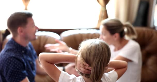 Little Girl Watching How Her Parents Swearing Covering Her Ears — Video