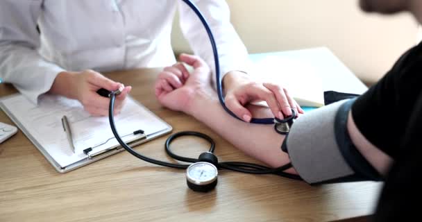 Doctor Cardiologist Measuring Blood Pressure Tonometer Patient Arterial Hypertension Closeup — Stockvideo