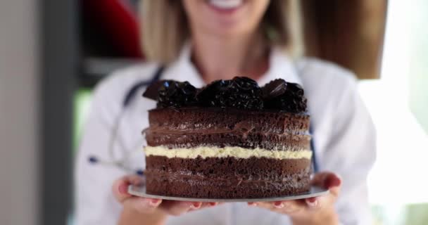 Woman Doctor Holding Appetizing Tasty Cake Closeup Movie Slow Motion — Αρχείο Βίντεο