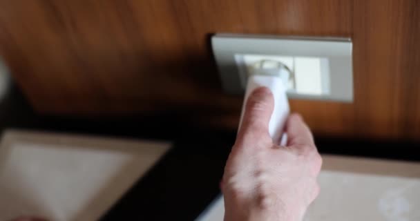 Man Hand Inserting Plug Socket Home Closeup Movie Slow Motion — Αρχείο Βίντεο