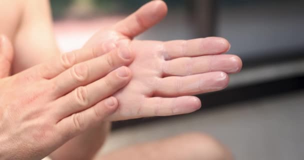 Man Applies Moisturizing White Cream Hands Hand Skin Care Concept — Stockvideo