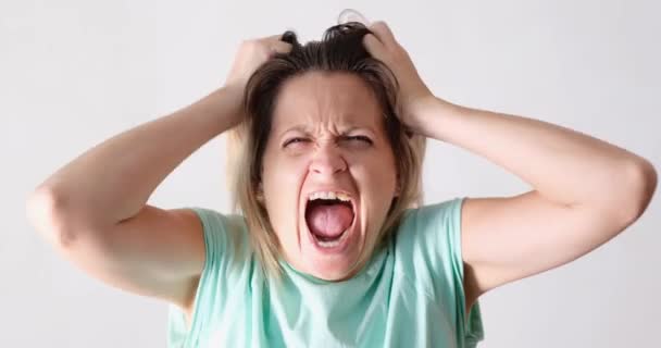 Young Woman Screaming Tearing Her Hair Out White Background Movie — Vídeo de Stock