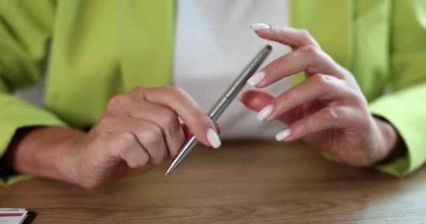 Woman Nervously Holds Pen Workplace Closeup Workplace Stress Nervous Waiting — Video