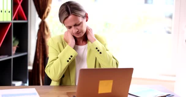 Tired Woman Rubs Stiff Sore Neck Tense Muscles Tired Working — Vídeo de Stock