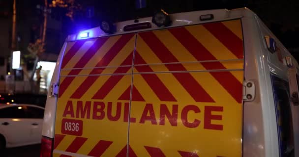 Ambulance City Street Evening Providing Urgent Medical Care — Wideo stockowe