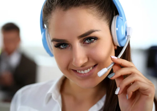 Beautiful brunette smiling call centre clerk at work portrait. Workplace employment effective mediation manager negotiation participation solve problem real time aid job concept