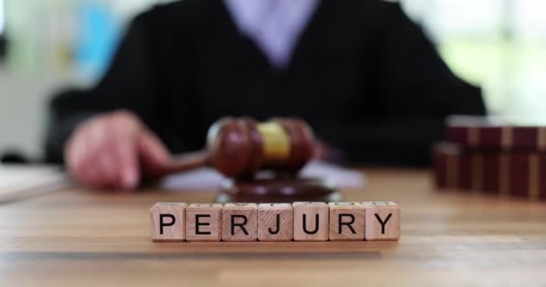 Word Perjury Made Wooden Cubes Judge Knocking Gavel Workplace Intentional — Stock Video