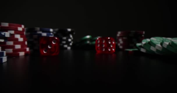 Multicolored Bunch Casino Chips Dices Stands Black Surface Dark Premise — Stock Video