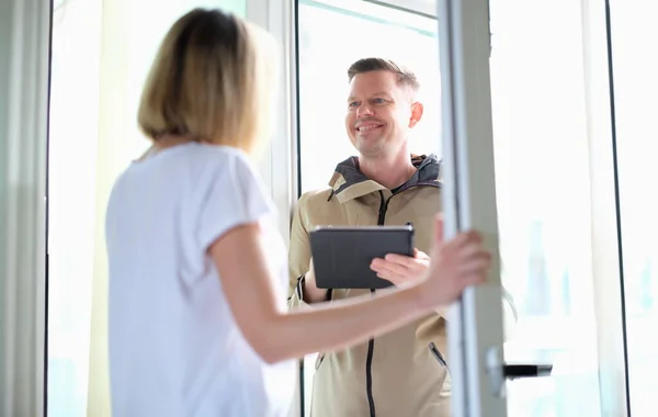 stock image Smiling man conducting social survey in apartment. Population census concept