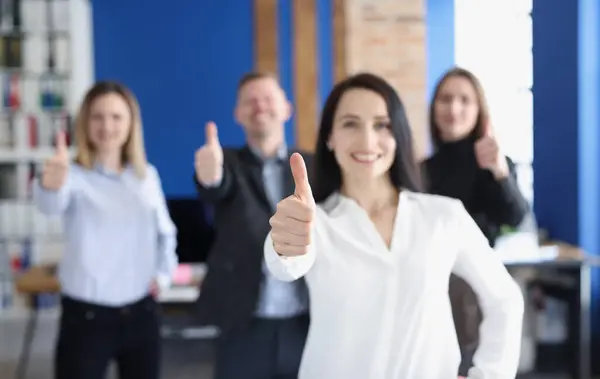 Business leaders with group of employees showing thumbs up. People recommend best corporate service and a good career concept