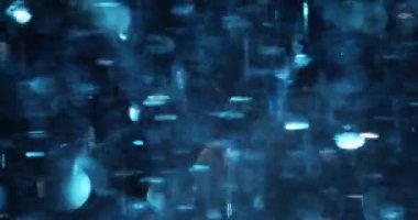 Mavi parlak arkaplan ve bulanık bokeh ile mavi soyut arkaplan. Yumuşak ışık arkaplanlı soyut bokeh ışıkları