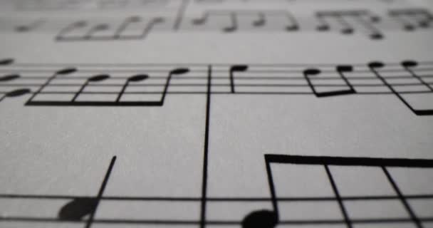 Closeup Άποψη Του Φύλλου Χαρτιού Σημειώσεις Φόντο Μουσική Εκπαίδευση — Αρχείο Βίντεο