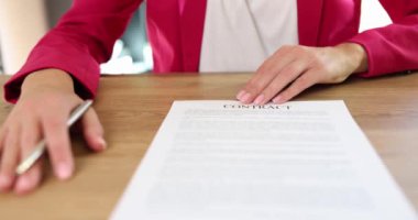 Manager submitting for signing of employment contract to employee closeup 4k movie slow motion. Official work with partners concept