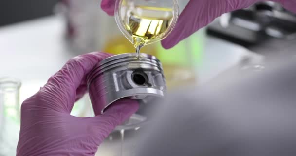 Scientist Chemist Pouring Engine Oil Piston Car Laboratory Closeup Movie — Stockvideo
