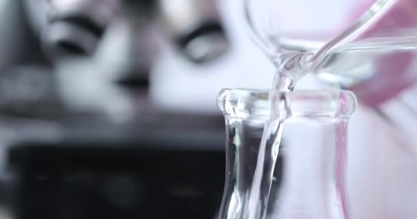 Scientist Chemist Pouring Water Test Tube Flask Laboratory Closeup Movie — Vídeo de Stock