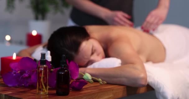 Jars Aromatic Oils Standing Background Masseur Woman Spa Movie Professional — Stockvideo