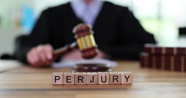 Word Perjury Made Out Wooden Cubes Judge Banging Wooden Gavel — Stock Video