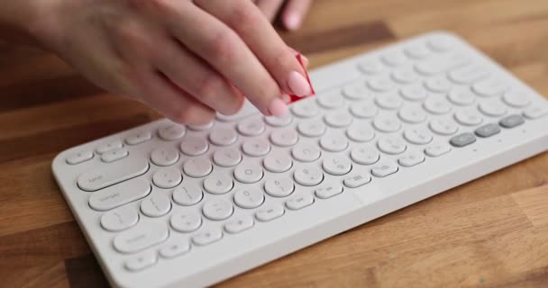Hands putting dice on computer keyboard closeup 4k movie. Online gambling concept