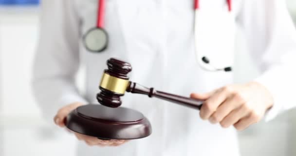 Doctor Knocks Judge Wooden Gavel Criminal Liability Medical Workers — Stock Video