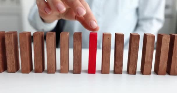 Businesswoman Takes Out Red Wooden Block Row Beige Ones Individual — Stock Video