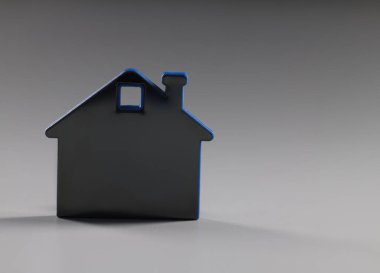 Minyatür ev oyuncaklarına yakın çekim, emlak ve konaklama sembolü, kiralık ya da satın alan, mülke yatırım yapan. Konut, ev, kiralık konsept