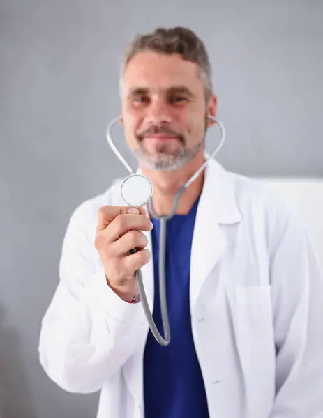 Handsome Mature Smiling Male Doctor Hold Arms Stethoscope Going Listen Royalty Free Stock Images