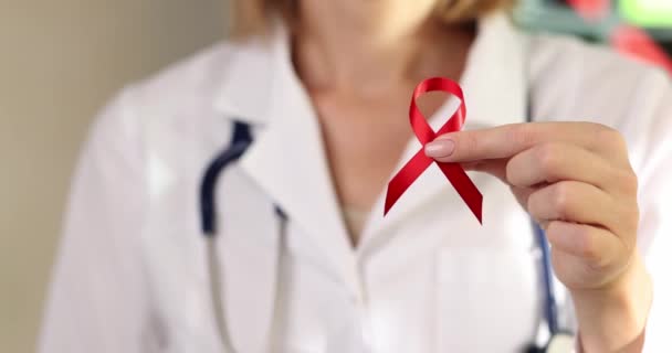 Doctor Clinic Shows Red Satin Ribbon Close Symbol Fight Breast — Stockvideo