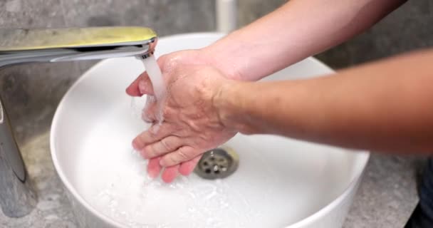Young Man Thoroughly Washing Hands Soapy Water Closeup Taking Care — Stock Video