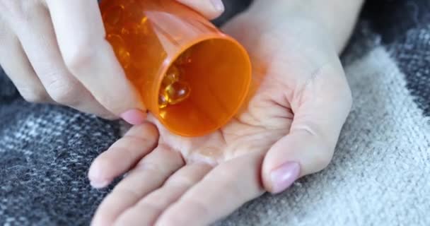 Woman Fish Oil Pills Pours Palm Closeup Flaxseed Oil Omega — Stockvideo