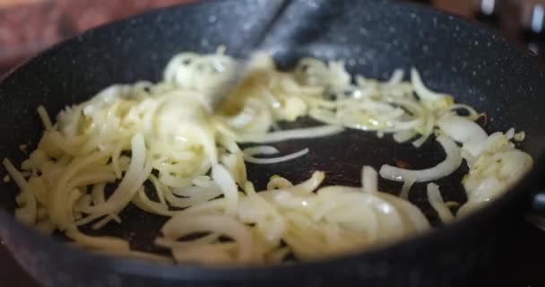 Woman Cooks Onions Frying Pan Stove Closeup Fry Fresh Onion — Stock Video