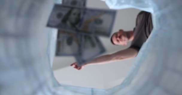 Person Threw Dollars Trash Bag Close Unexpected Expenses Concept Slowmotion — Stock Video