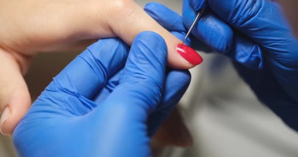Manicurist Processes Cuticle Womans Nails Close Beauty Treatments Hands Red — Stock Video