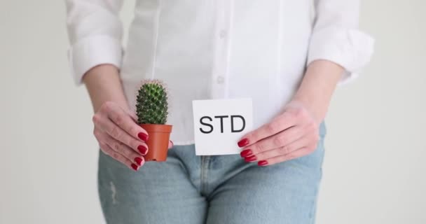 Girl Holds Cactus Sheet Paper Written Std Consequences Sexually Transmitted — Stock Video