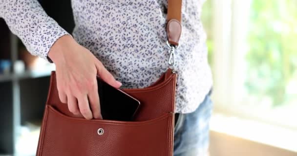 Woman Hand Put Phone Leather Bag Fashionable Stylish Business Bag — Stock Video