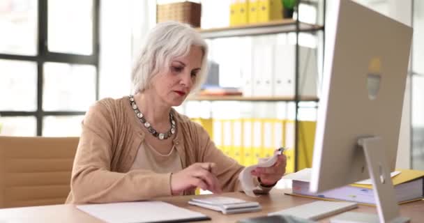 Mature Woman Accountant Sits Desk Sorts Out Bills Makes Payments — Stock Video
