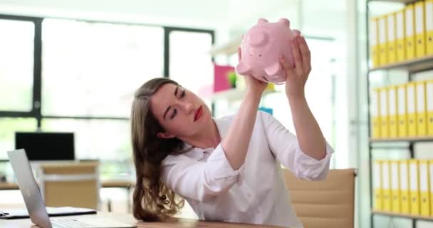 Upset Woman Shaking Empty Piggy Bank Office Financial Crisis Money — Stock Video