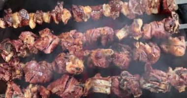 Lamb meat cooked on hot grill barbecue. Grilled lamb ribs for barbecue concept